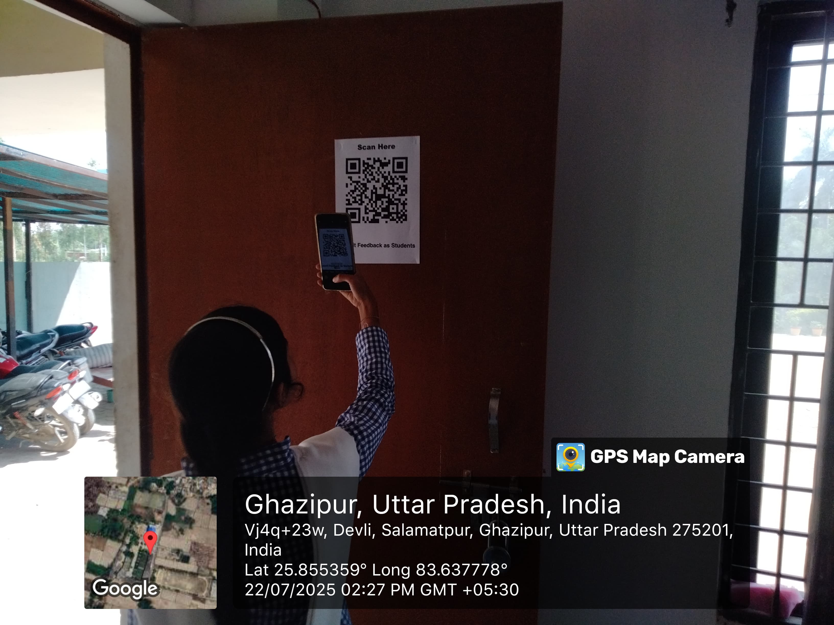 Student scanning IQAC feedback QR code